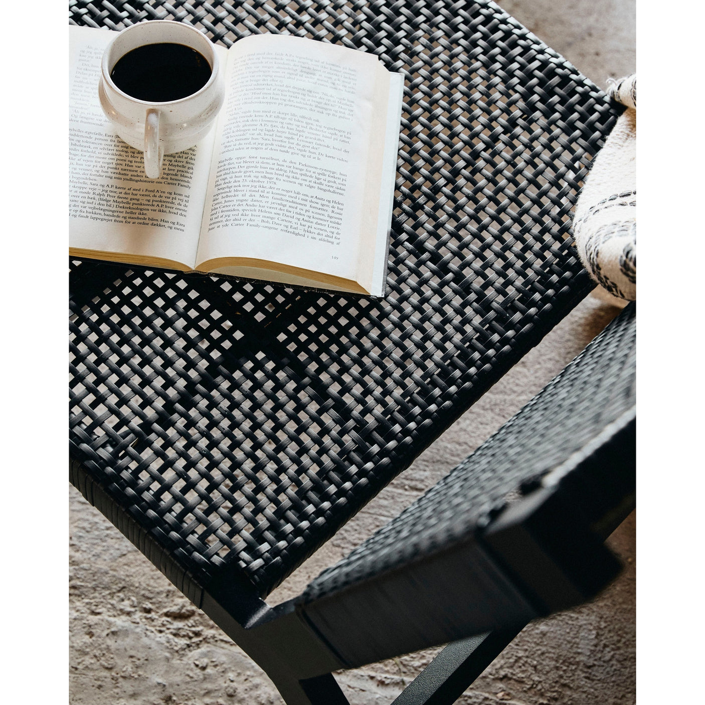 VASAI lounge hagestol i flettet polyrattan - svart Nordal GARDEN FUR