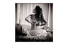 Glass picture Young woman in the bedroom 120cm x 120cm Homefactory 